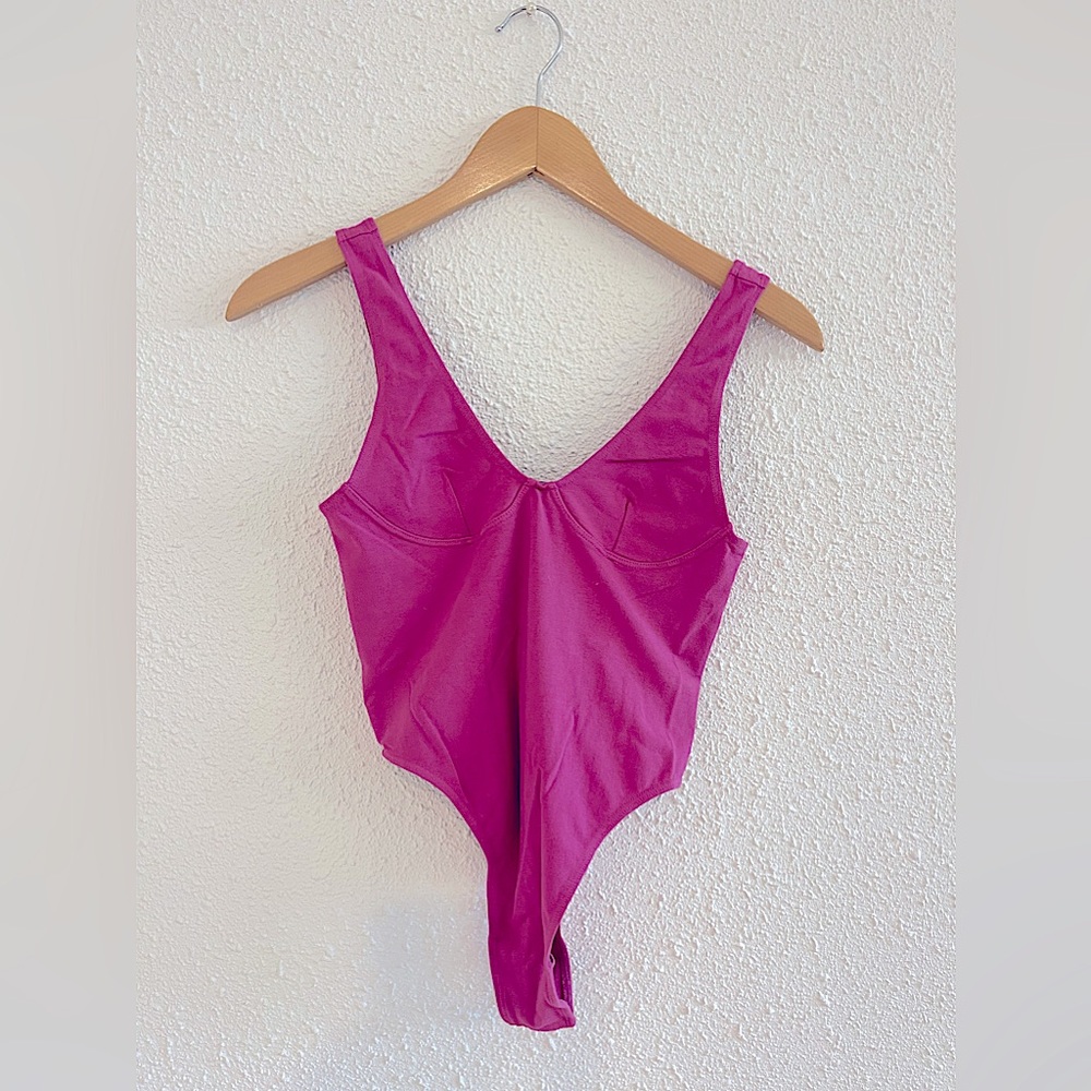 Pink bodysuit